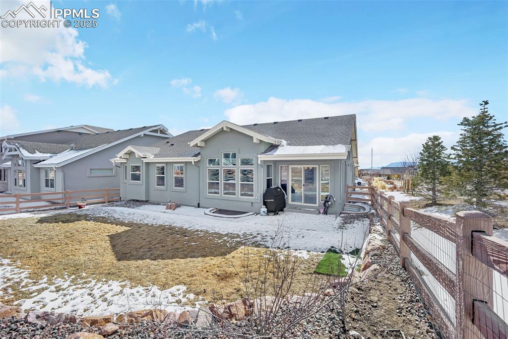 Image 42 of 45: Spacious backyard with ready gas hookups for a grill and/or firepit