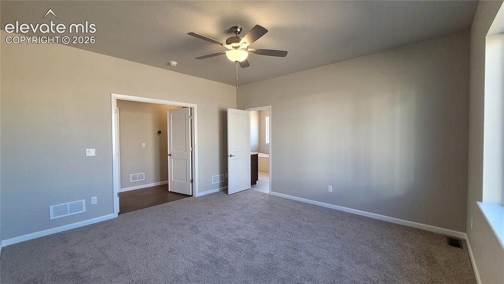 Image 11 of 39: Master Bedroom