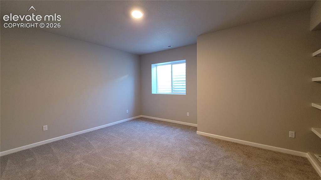 Image 20 of 39: Bedroom
