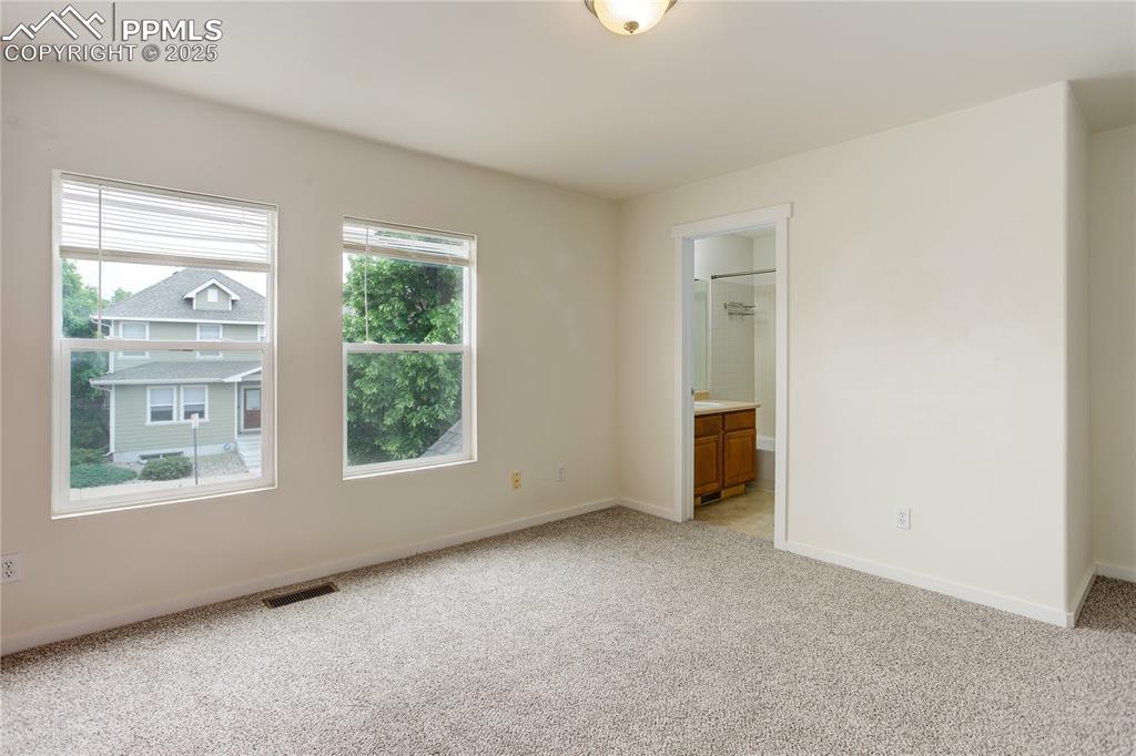 Image 18 of 30: Master Bedroom