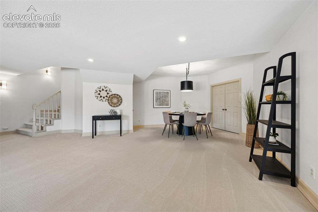 Image 29 of 50: Walk out basement, 2-way gas fireplace living space