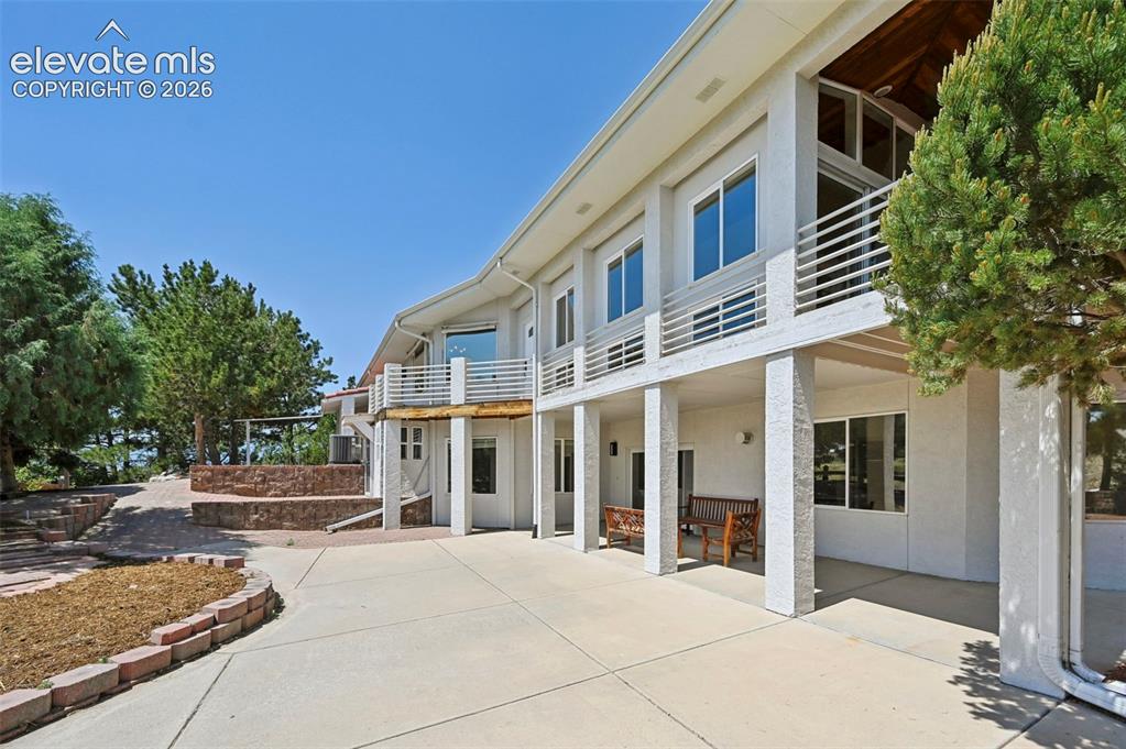 Image 43 of 50: 6 car tandem garage, plus paved RV space on west exterior
