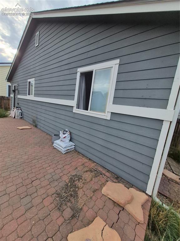 Image 3 of 17: Grey horizontal siding with white trim