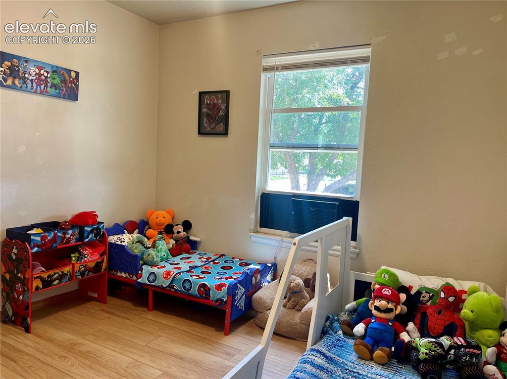 Image 13 of 21: Third bedroom with flexible use options