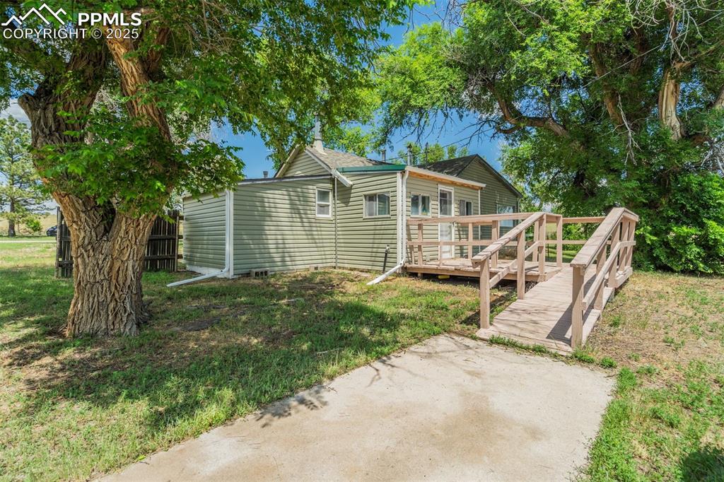 Image 29 of 50: Front Entrance to 2nd home with wheelchair ramp