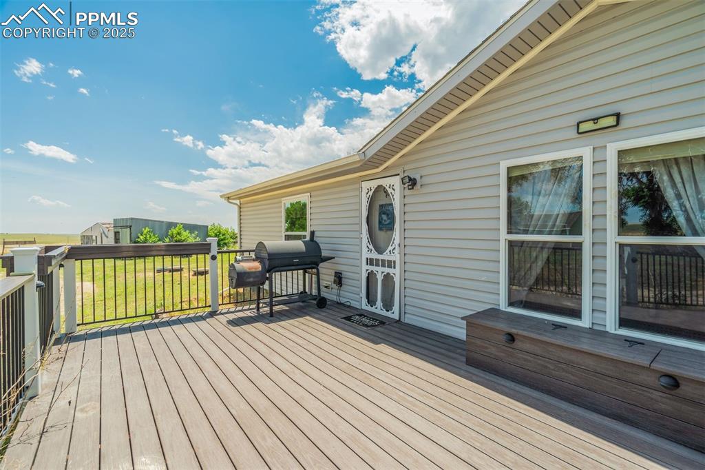 Image 6 of 50: Deck with area for grilling