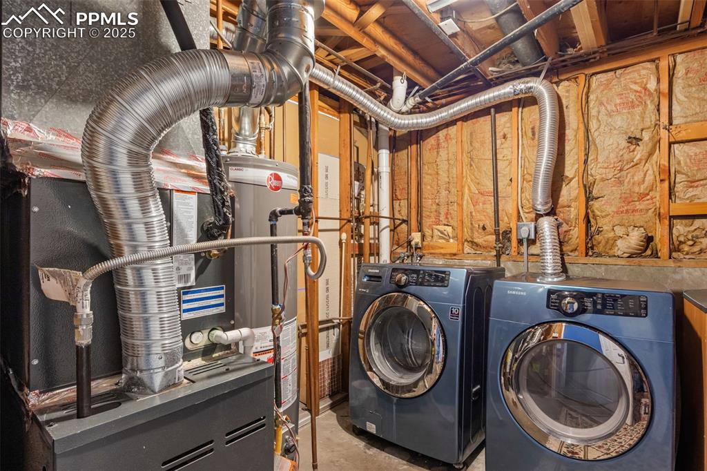 Image 23 of 28: Utility room with laundry space