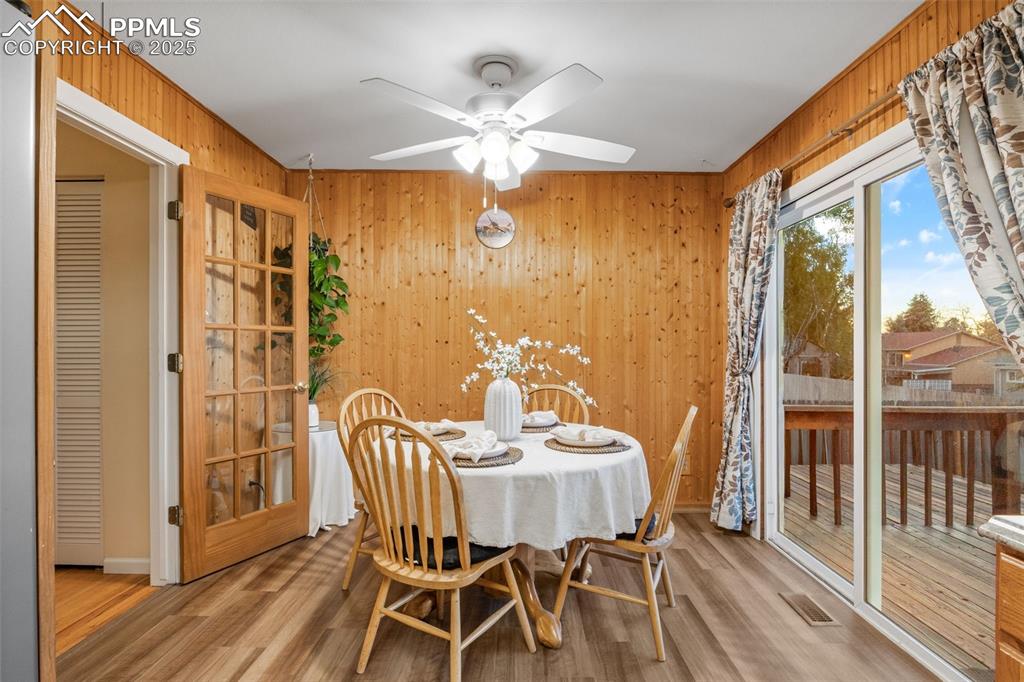 Image 6 of 28: Dining room with French doors to living room