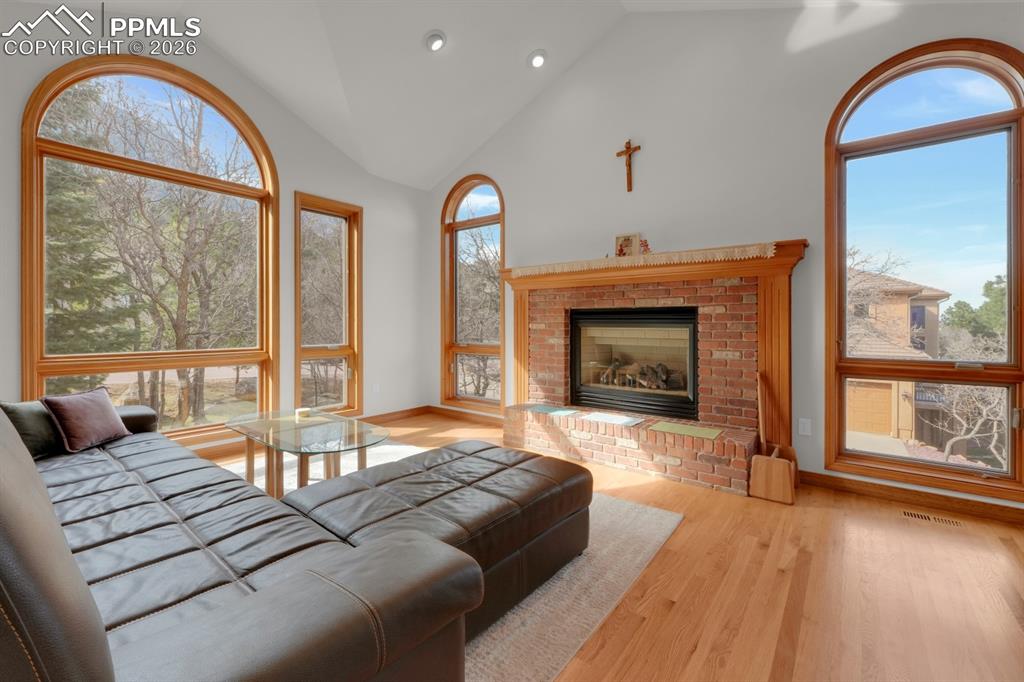 Image 12 of 48: Mountain views & cozy fireplace