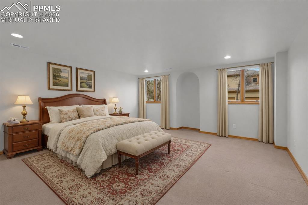 Image 32 of 48: Virtually Staged Basement Bedroom with walk in Closet