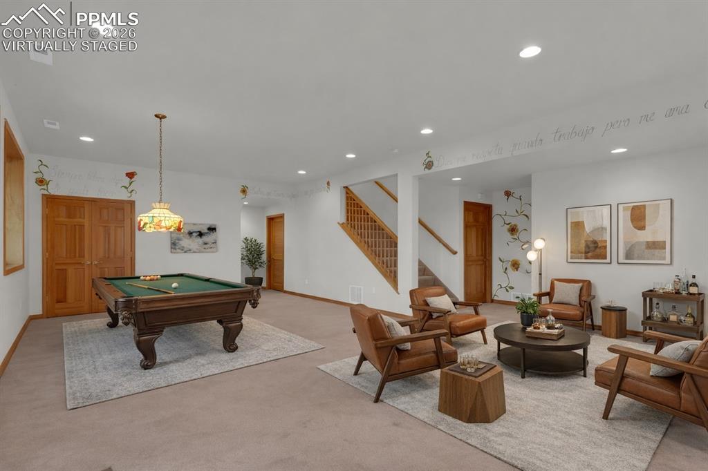Image 35 of 48: Virtually Staged Basement Family Room