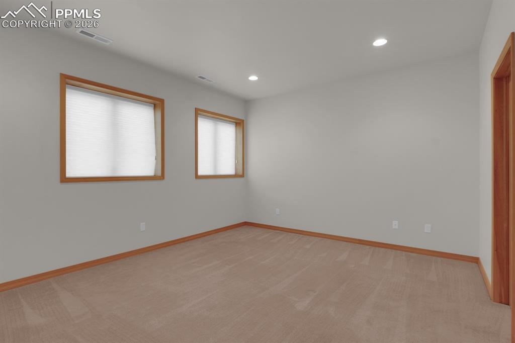 Image 38 of 48: Basement Bedroom