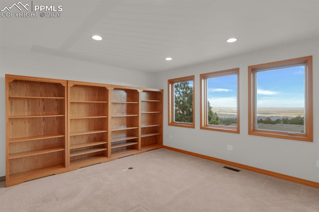 Image 4 of 48: Loft with bookcases & amazing views!