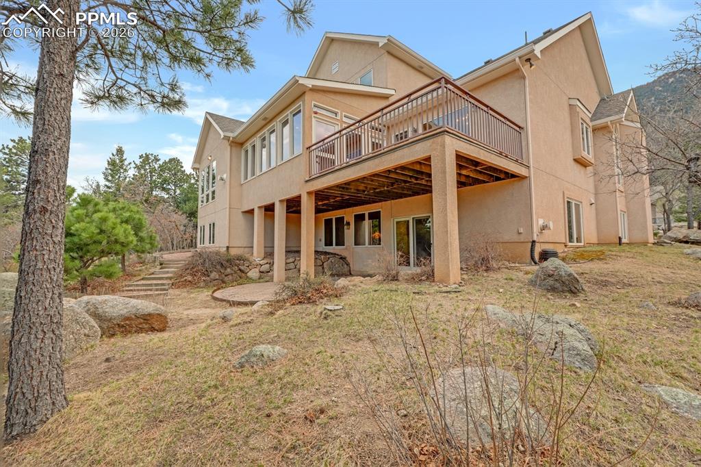 Image 7 of 48: Large deck on back of home