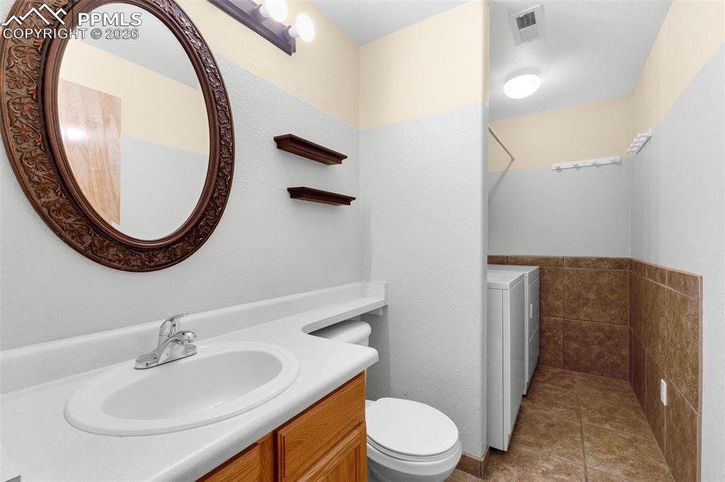 Image 34 of 50: Lower Level Half Bath