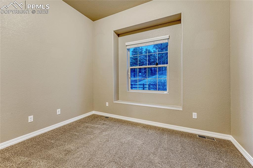 Image 22 of 50: Bedroom