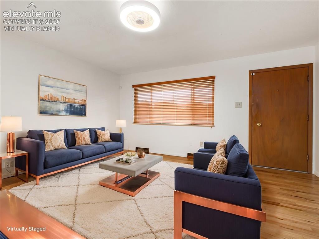 Image 4 of 34:  Virtually Staged, Recessed lighting, wood-finish flooring, and a window wi