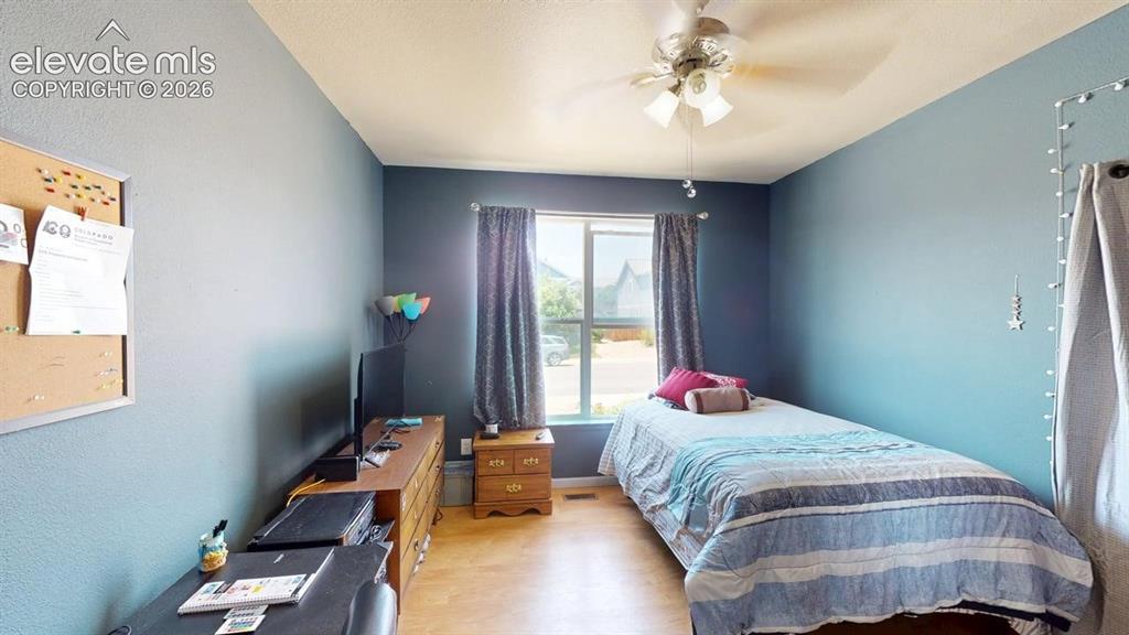 Image 11 of 20: Room featuring light-colored flooring, a window with curtains, and a ceilin