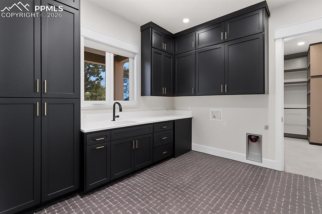 Image 36 of 48: Primary Bedroom Laundry