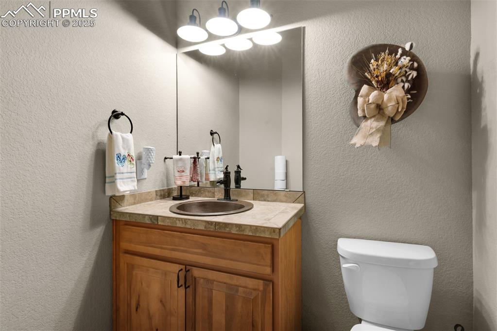 Image 25 of 48: main level powder bath