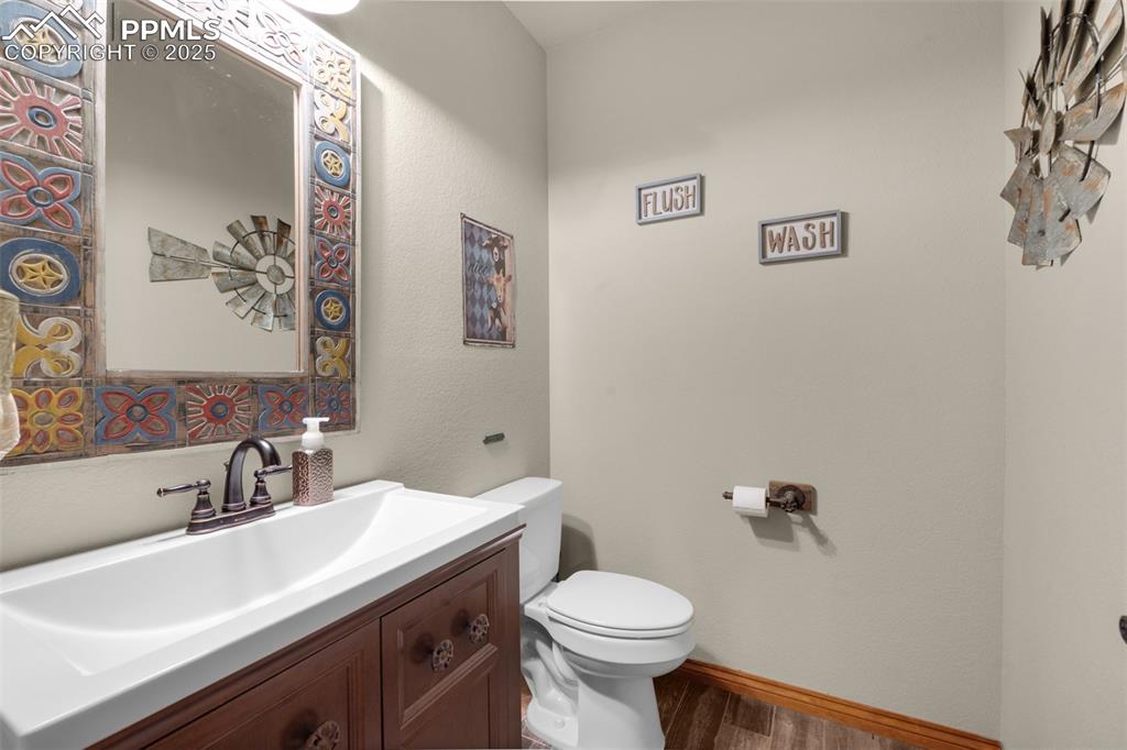 Image 33 of 48: Basement powder bath