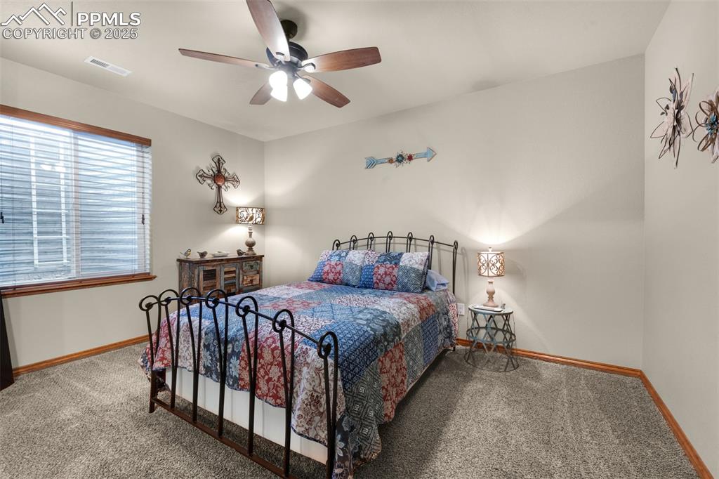 Image 34 of 48: Basement bedroom with Jack-n-jill bath