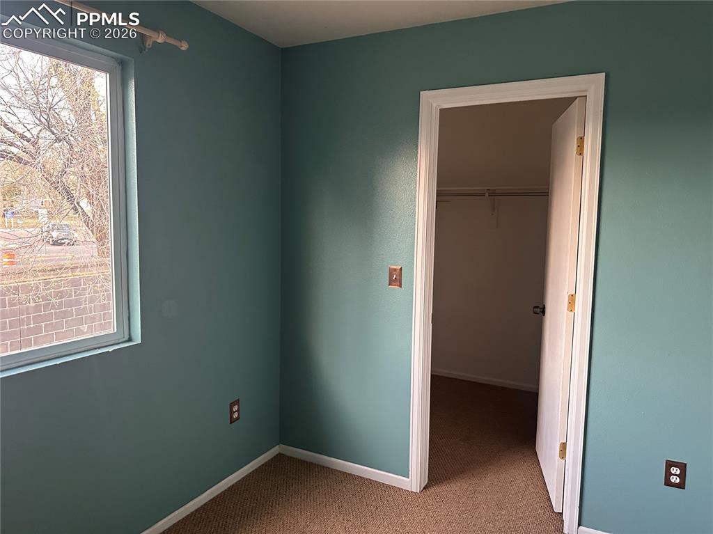 Image 21 of 33: View of walk-in closet