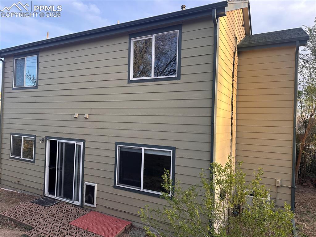 Image 29 of 33: Back of home