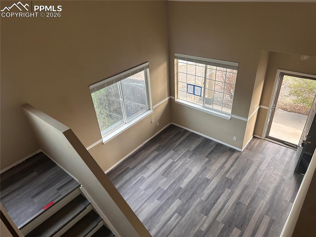 Image 3 of 33: Looking down at living room from the loft