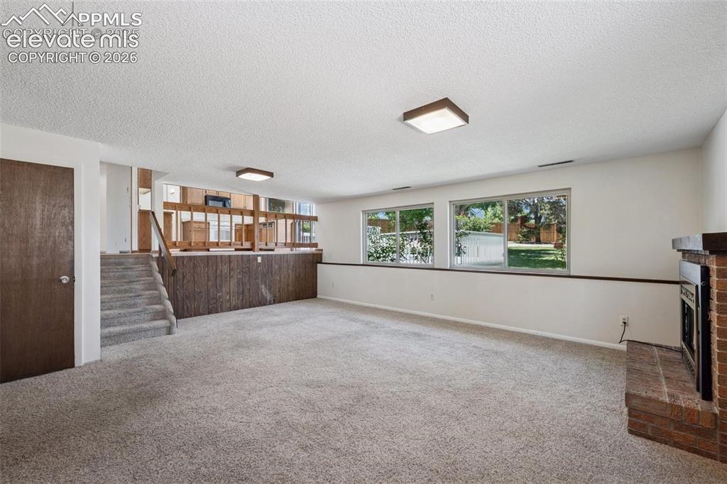 Image 11 of 42: Flexible Living and Dining Space 2 -Lower Level