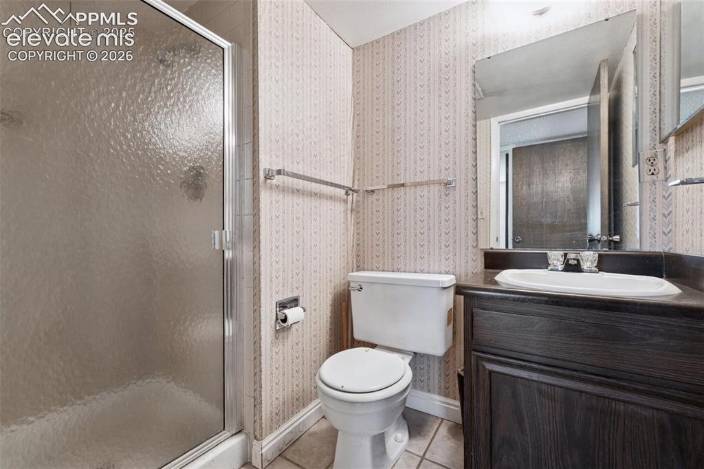 Image 27 of 42: Bathroom 3 - Lower Level across from Bedroom 4