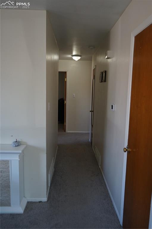 Image 10 of 22: Hall featuring carpet floors
