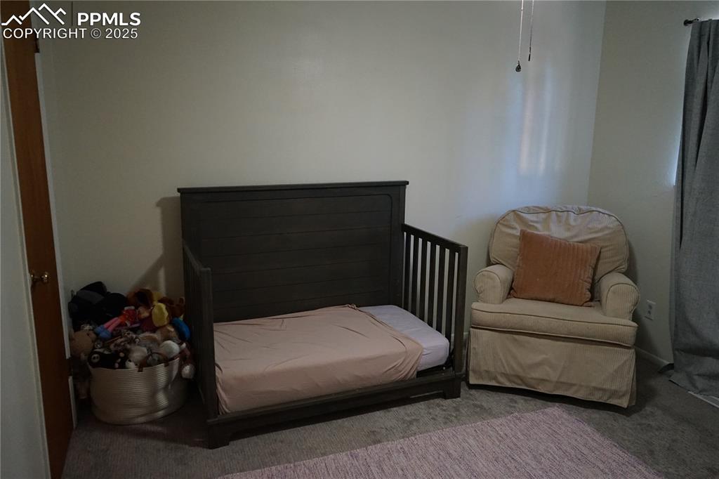 Image 14 of 22: View of carpeted bedroom