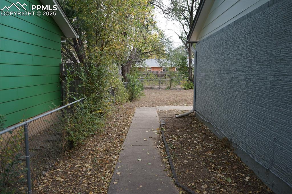 Image 20 of 22: View of side of property