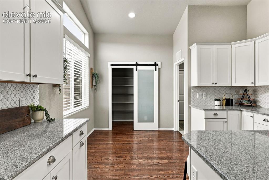 Image 18 of 49: Spacious pantry and nook for eat-in kitchen