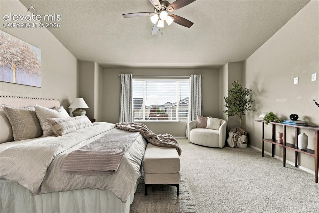 Image 27 of 49: Primary suite offers plenty of space to create your own private retreat.