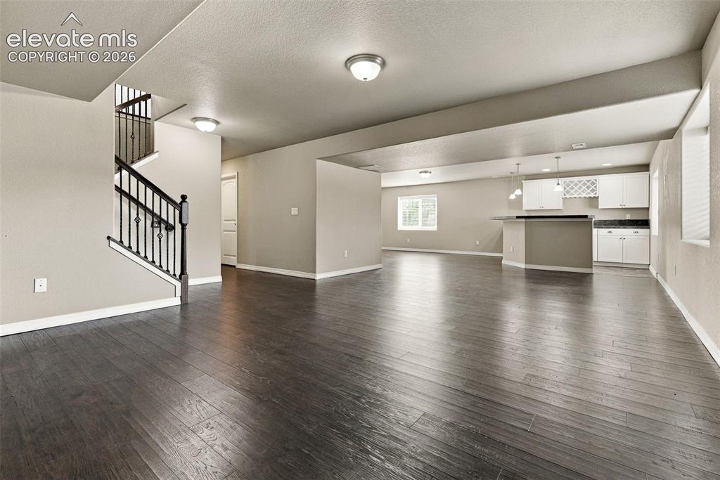 Image 34 of 49: Finished basement offers an incredible amount of flexible living and entert