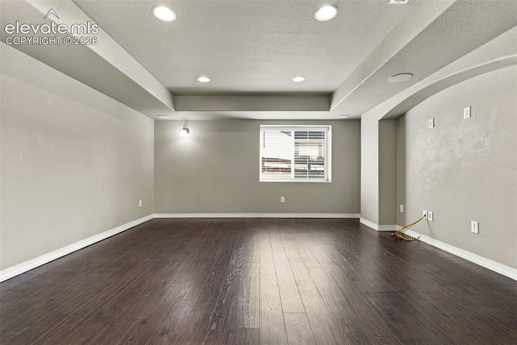 Image 39 of 49: Spacious theater room ready for movie nights and entertainment, or easily r