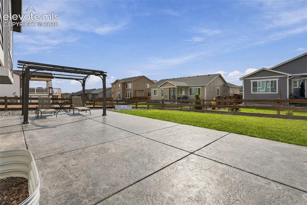 Image 41 of 49: Spacious backyard is a blank canvas ready for your vision.