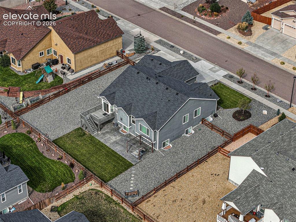 Image 46 of 49: Overhead view provides a clear look at the property and surrounding homes.