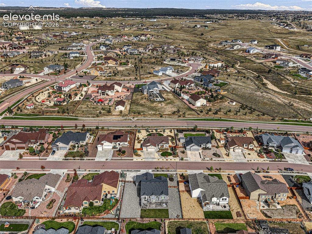 Image 47 of 49: Wide aerial view showcases the home’s Meridian Ranch location and surroundi