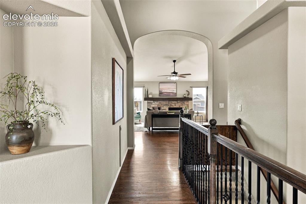 Image 6 of 49: Open hallway provides an easy flow between the home’s main living spaces.