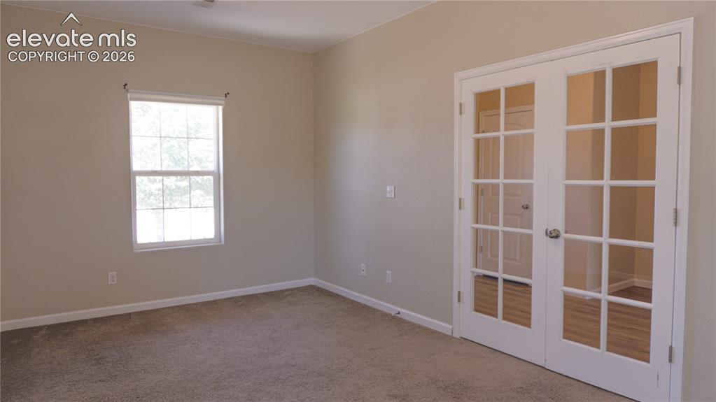 Image 11 of 32: Office just off the entry