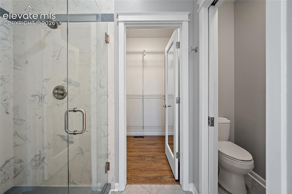 Image 33 of 50: Custom shower with shelves