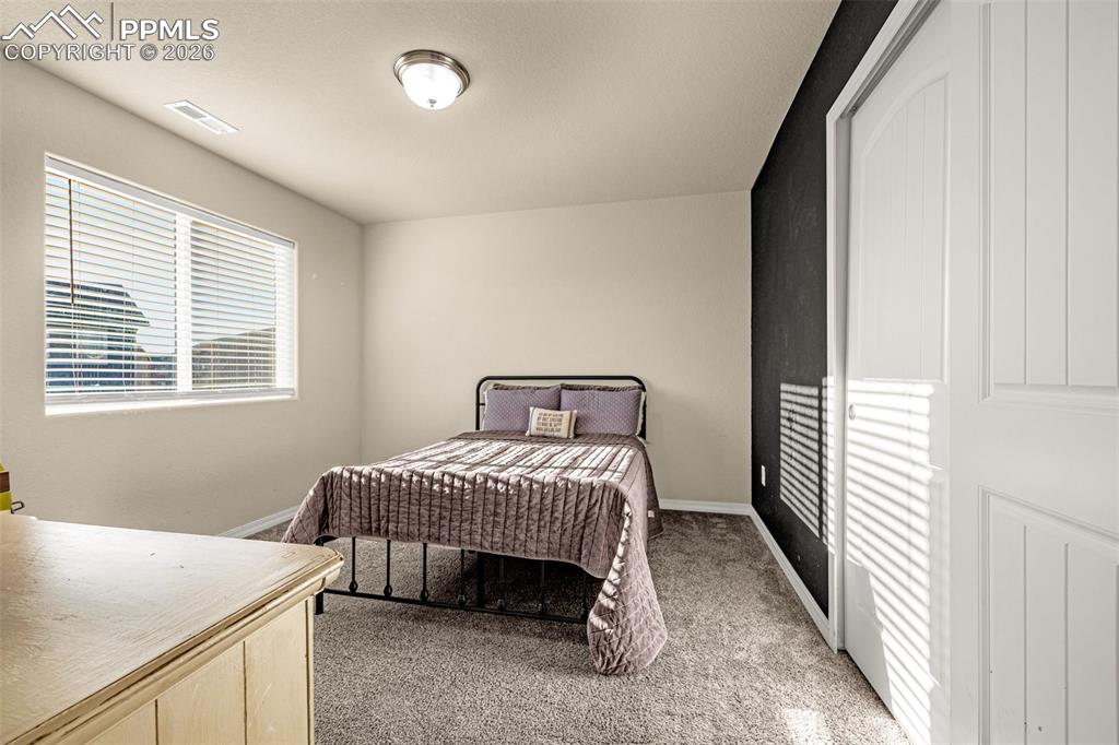 Image 12 of 33: Bedroom