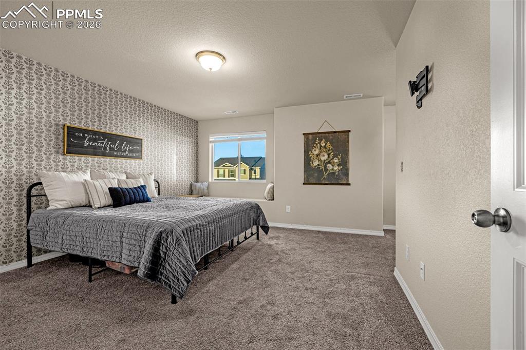 Image 14 of 33: Bedroom