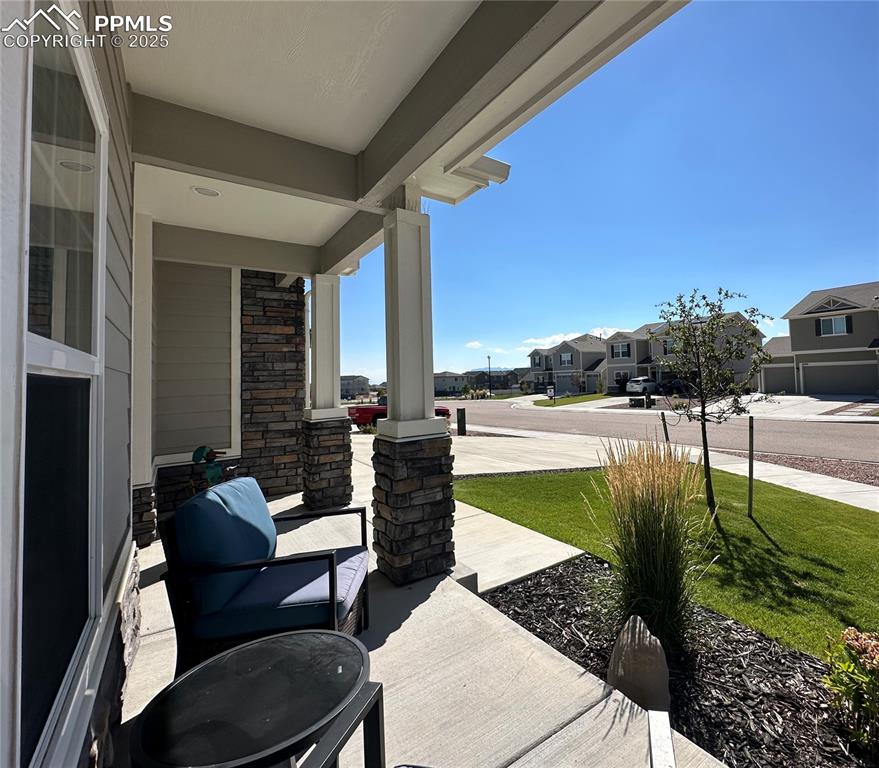Image 5 of 42: Porch with a residential view