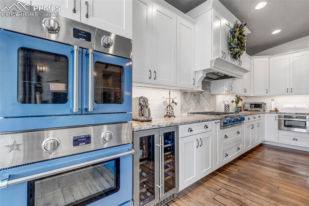 Image 23 of 50: tongue and groove detail, floor to
ceiling gas fireplace