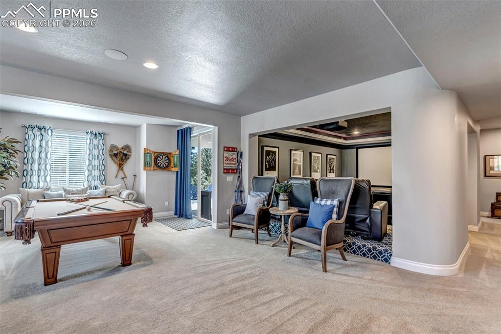Image 35 of 50: Laundry room featuring independent washer and dryer and cabinet space