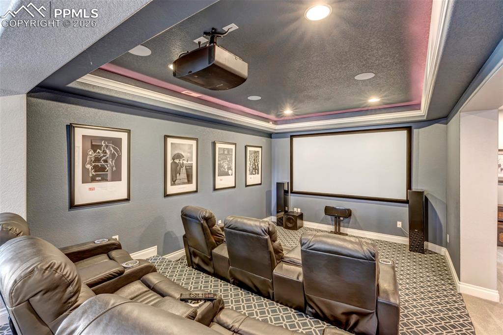 Image 36 of 50: Playroom with pool table, a textured ceiling, light carpet, recessed lighti